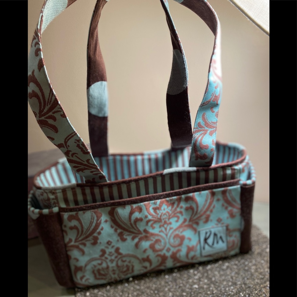 RuthMichael brown and light blue organizer travel